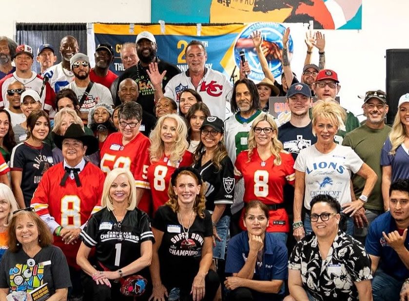 Champions for the Homeless volunteers, NFL alumni, and community members gathered at a recent event